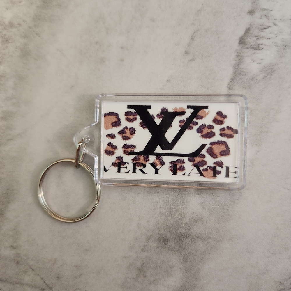 "Very late" double sided keychain